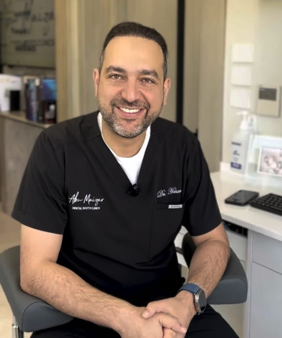 د. حسن أبو ميزر — طب الأسنان وعلاج الجذور